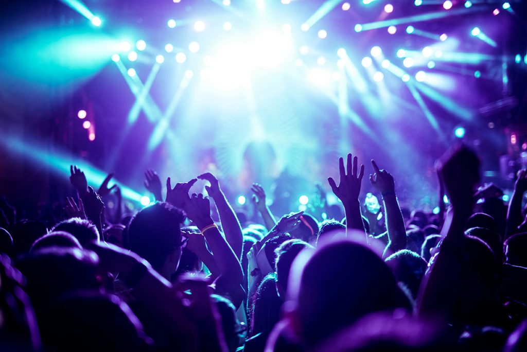 People at a live concert at a club