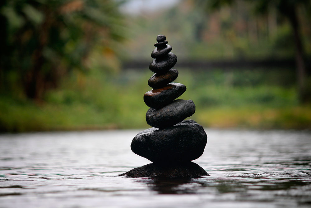 stack of rocks reflecting meditation