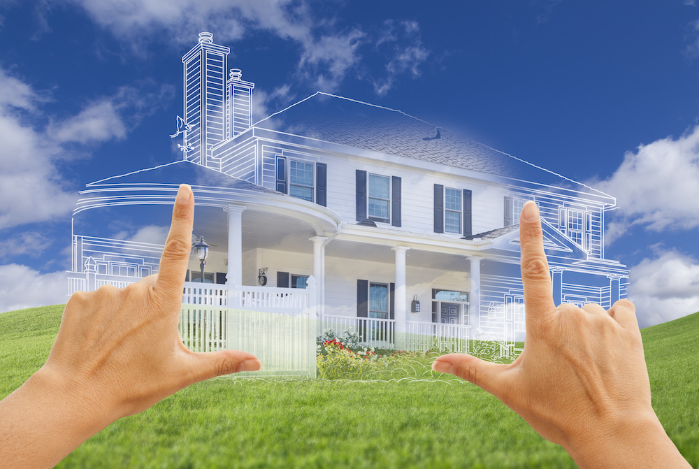 Hands Framing Beautiful House Drawing and House Above Grass