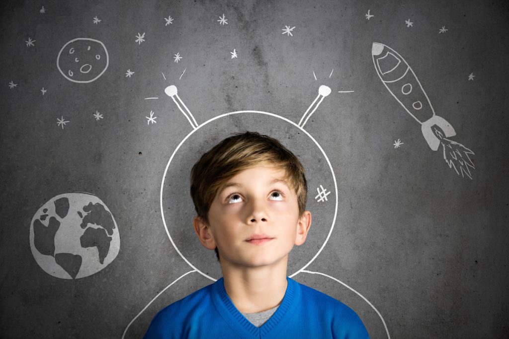 boy dreaming of being an astronaut
