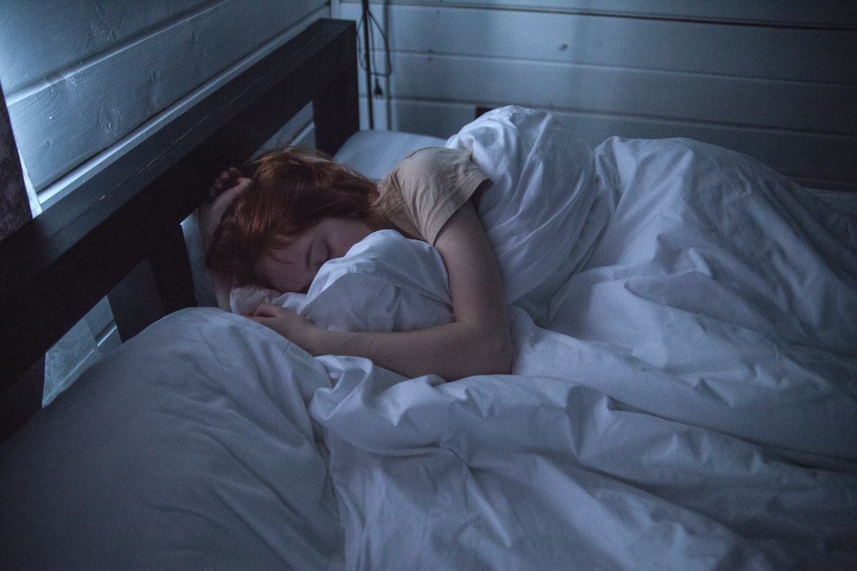 woman asleep in bed