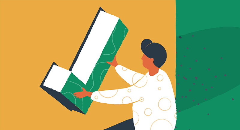 woman placing giant green checkmark
