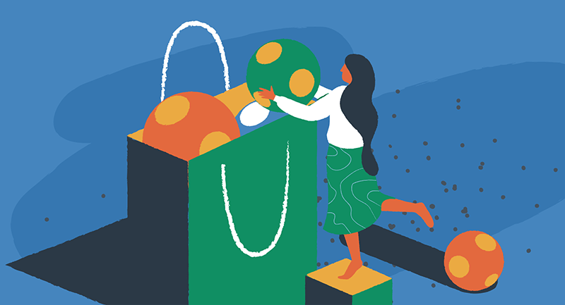 woman adding balls to a shopping bag