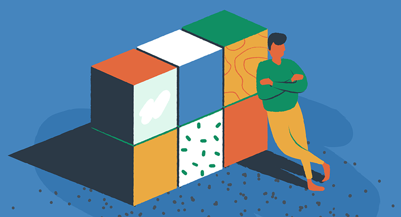 man leaning against blocks